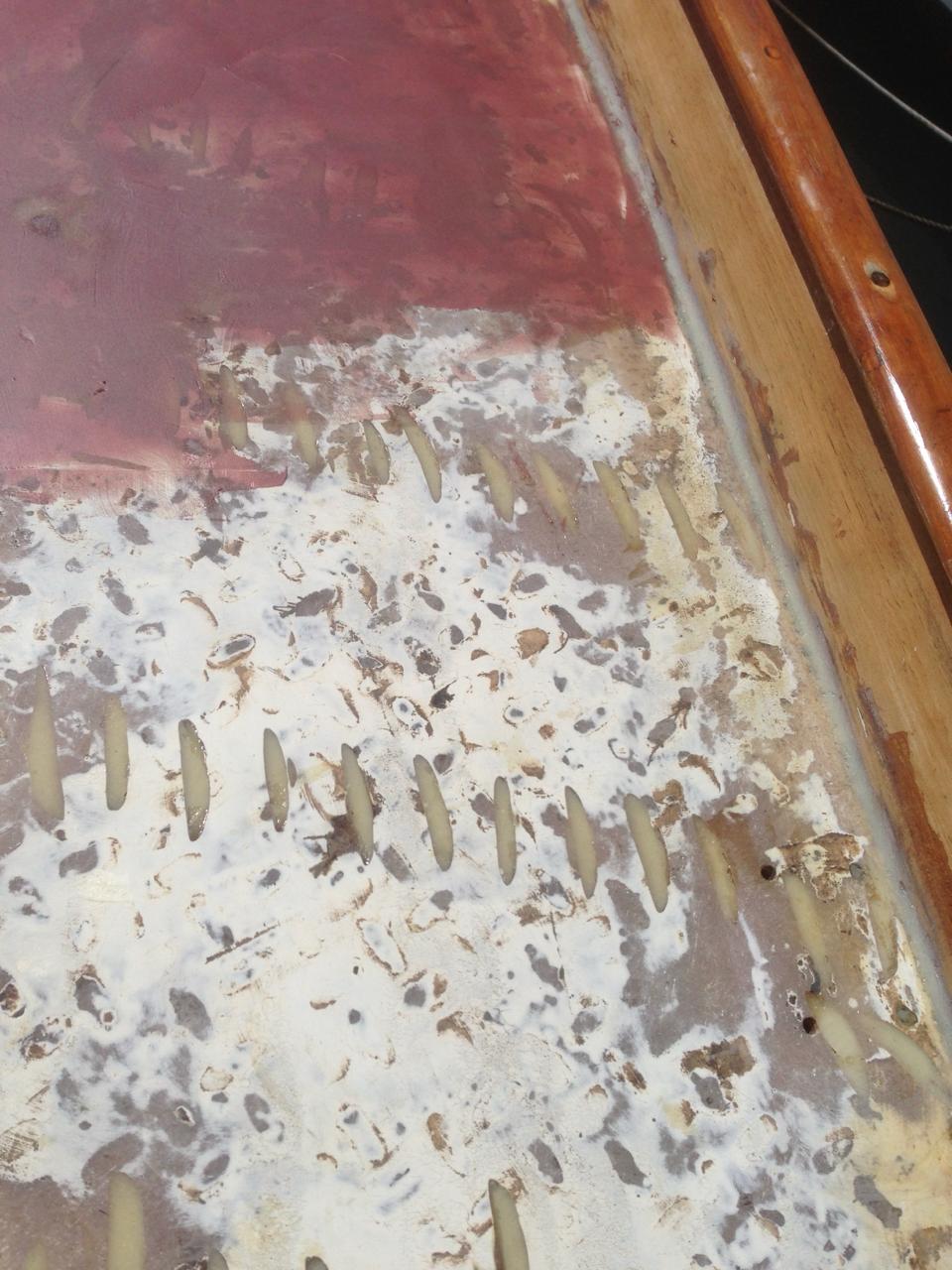 Epoxy covered deck with grinder marks