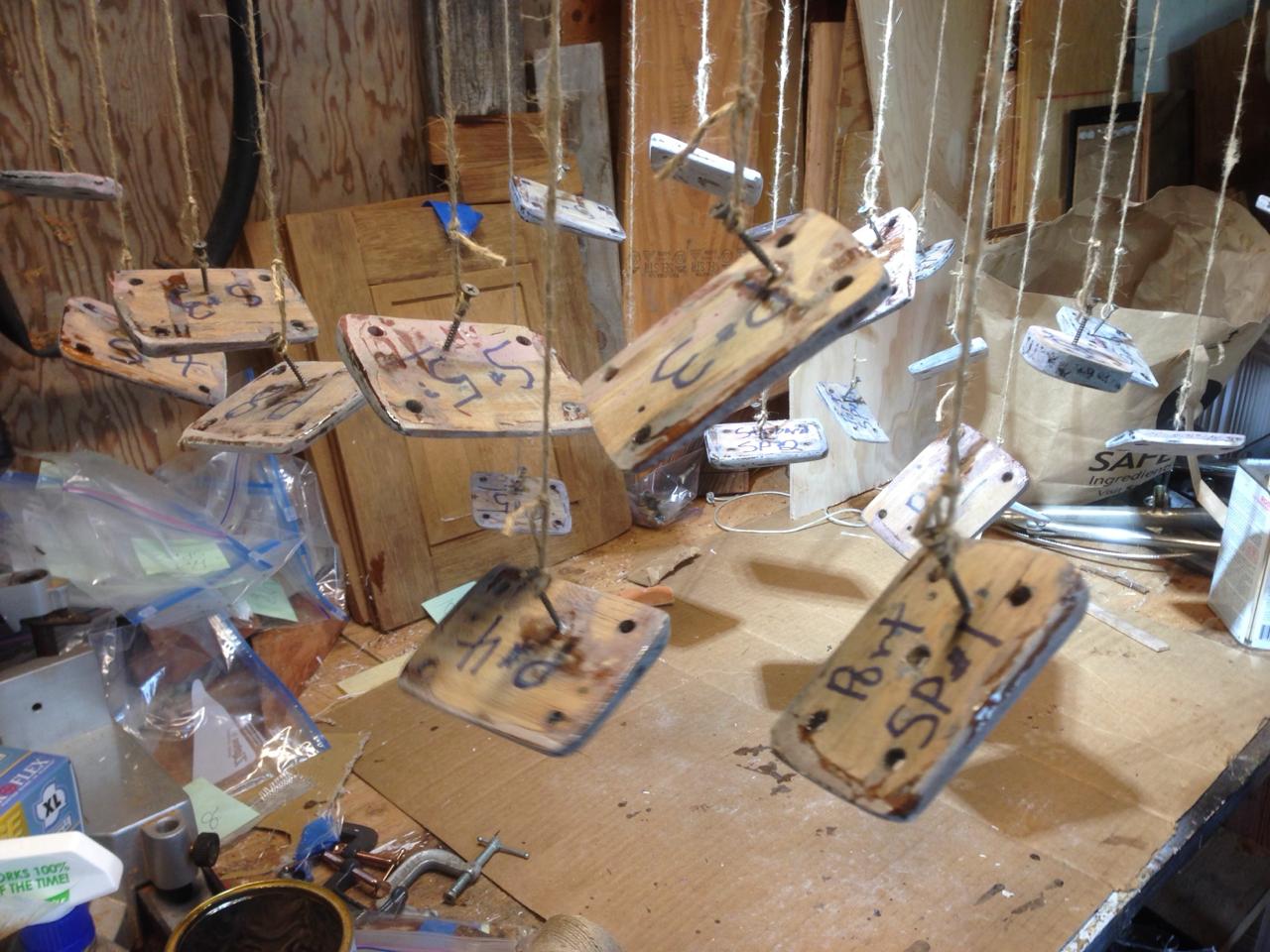Stanchion bases dangling from strings